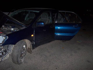 Mitsubishi Lancer ДТП, разбитое авто, вид слева.